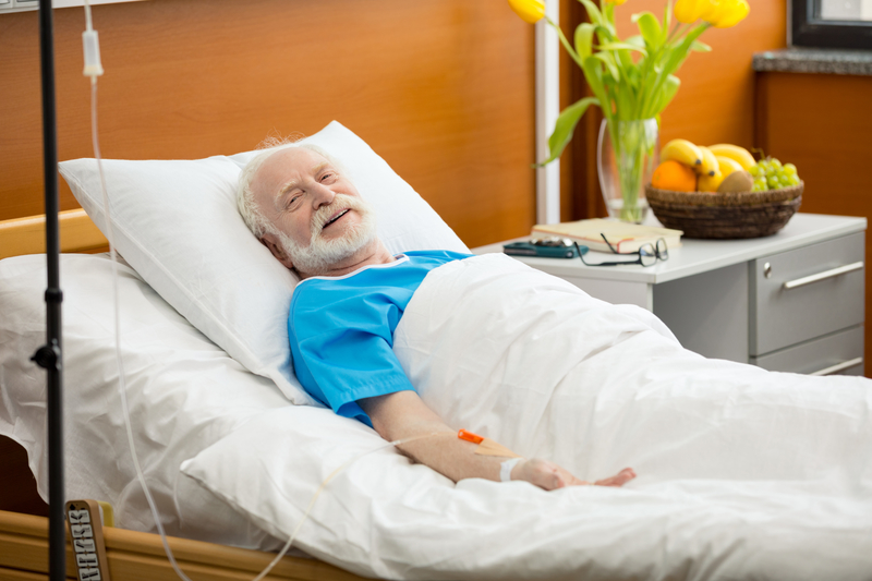 elderly man on hospital bed
