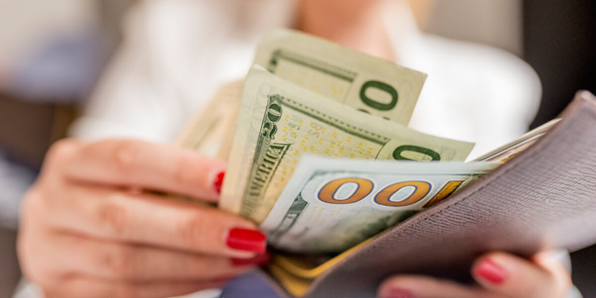 open wallet with money - expenses able account pay for - certified financial planning services