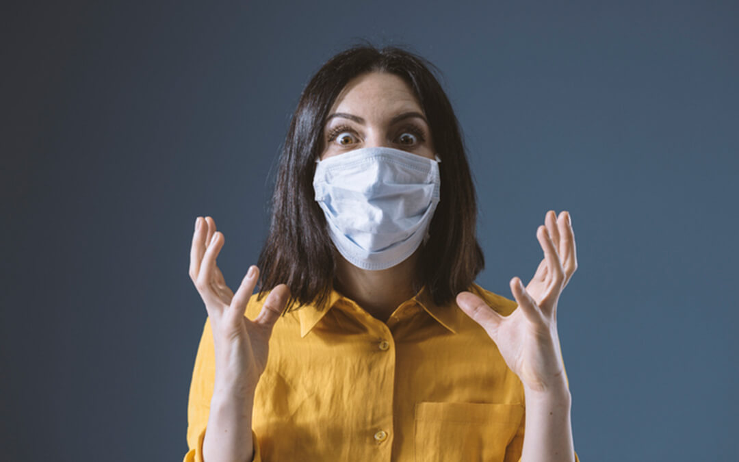 panicked woman in face mask - no time to panic for special needs people with financial planning