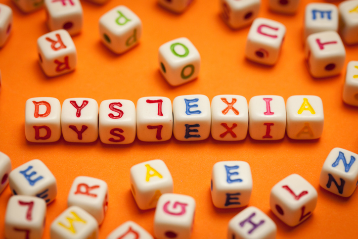 DYSLEXIA spelled in letters on an orange background